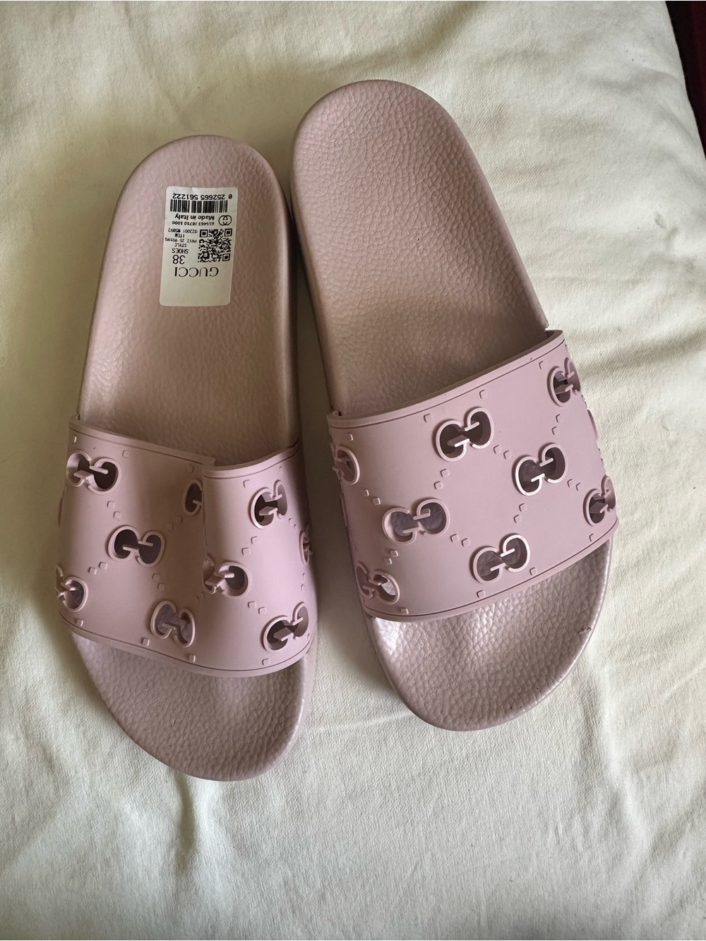 Gucci Light Pink GG Embossed Slide Sandals